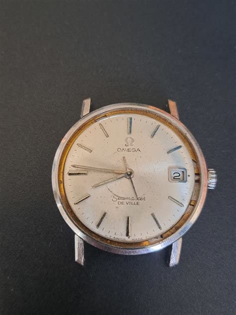 sell broken omega watch in australia